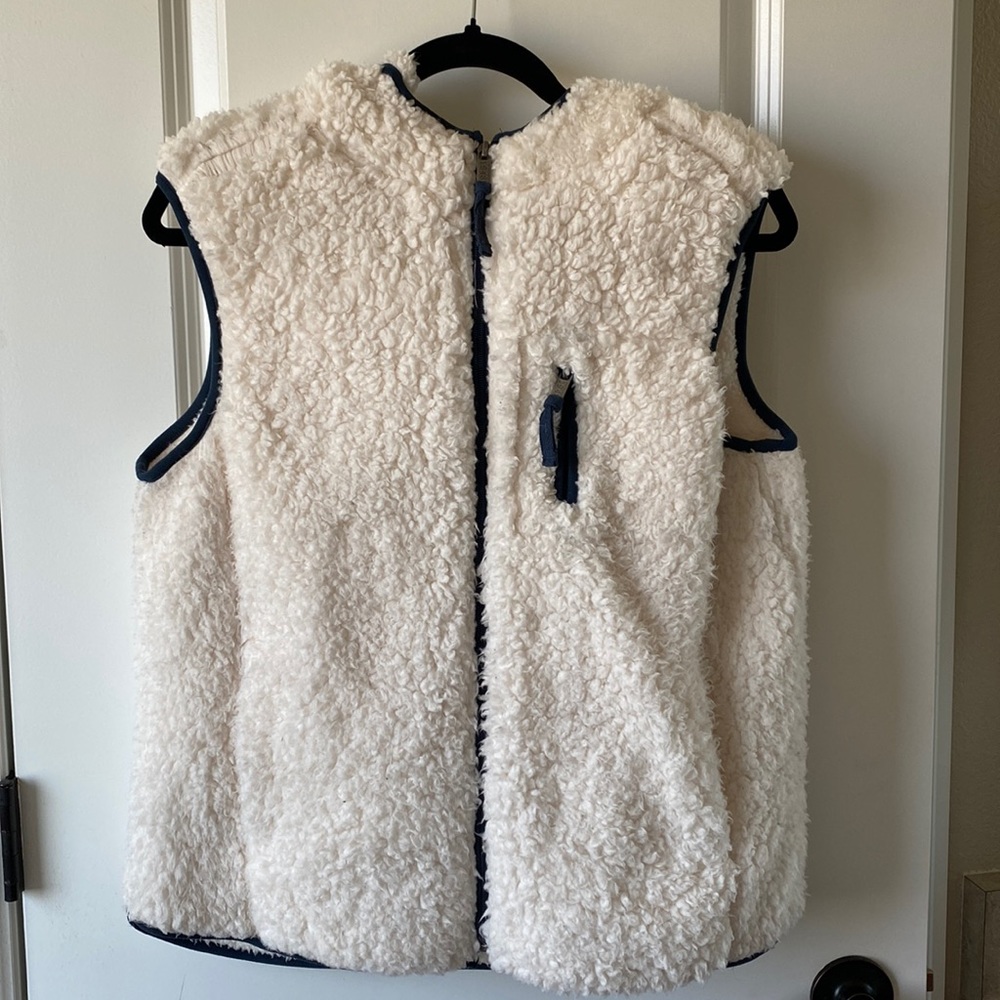 Weatherproof fuzzy cream vest